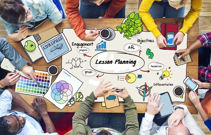 photo of a group of people around a table collaborating on Lesson Planning